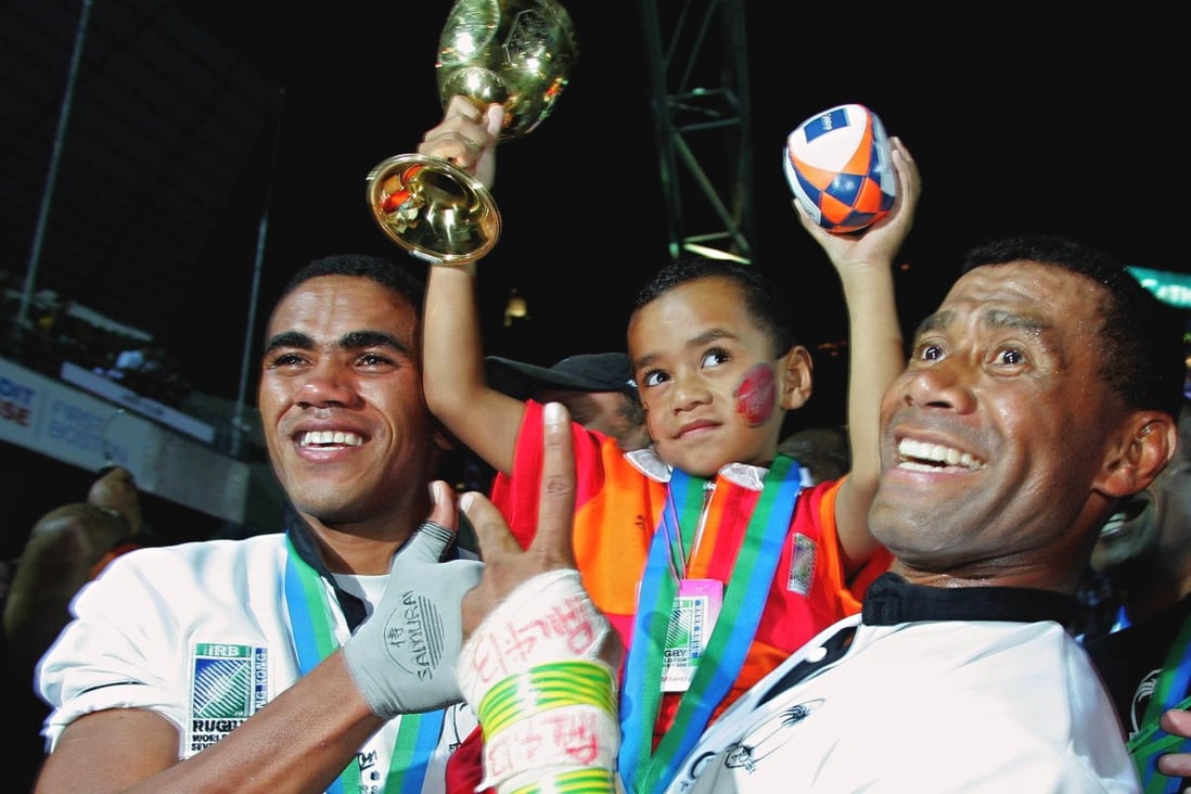 Fiji’s Waisale Serevi (right) celebrates with his son after winning the 2005 Rugby World Cup Sevens in Hong Kong. Photo: AP