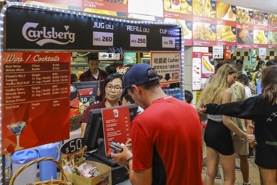 Fans at an earlier Rugby Sevens tournament stock up up on drinks. Photo: Sam Tsang.

