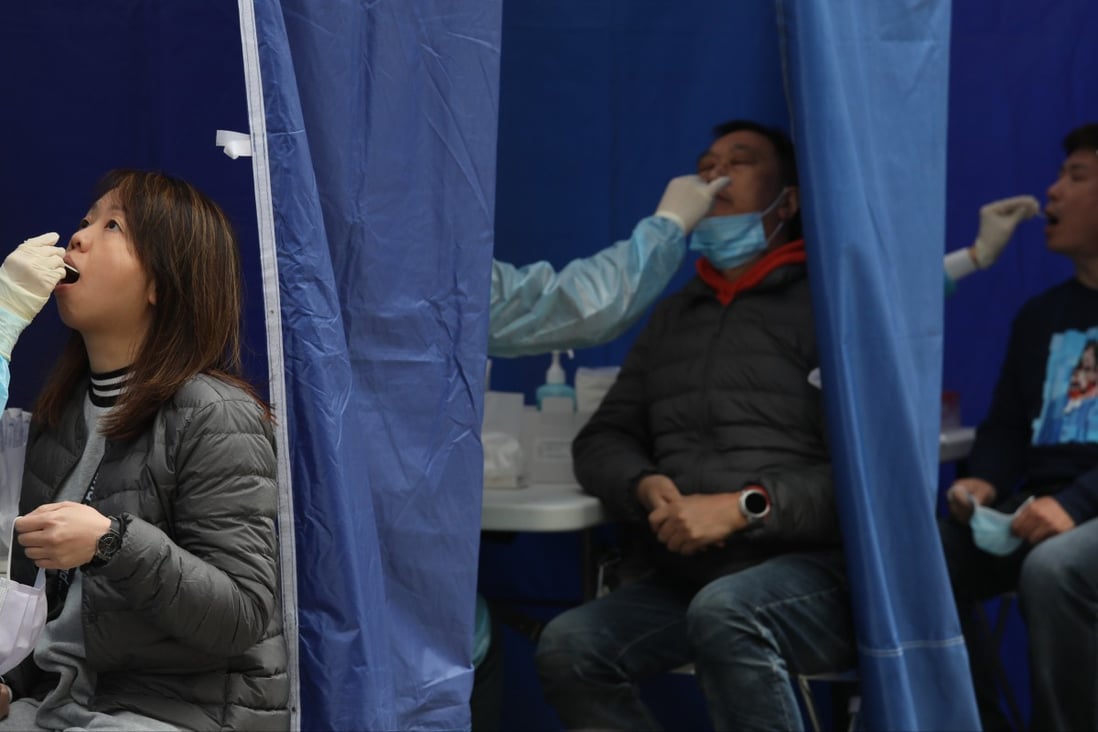 Hong Kong authorities have said that from Tuesday, only throat swab samples would be collected for free PCR tests at government-run sites, including those at the airport. Photo: Yik Yeung -man