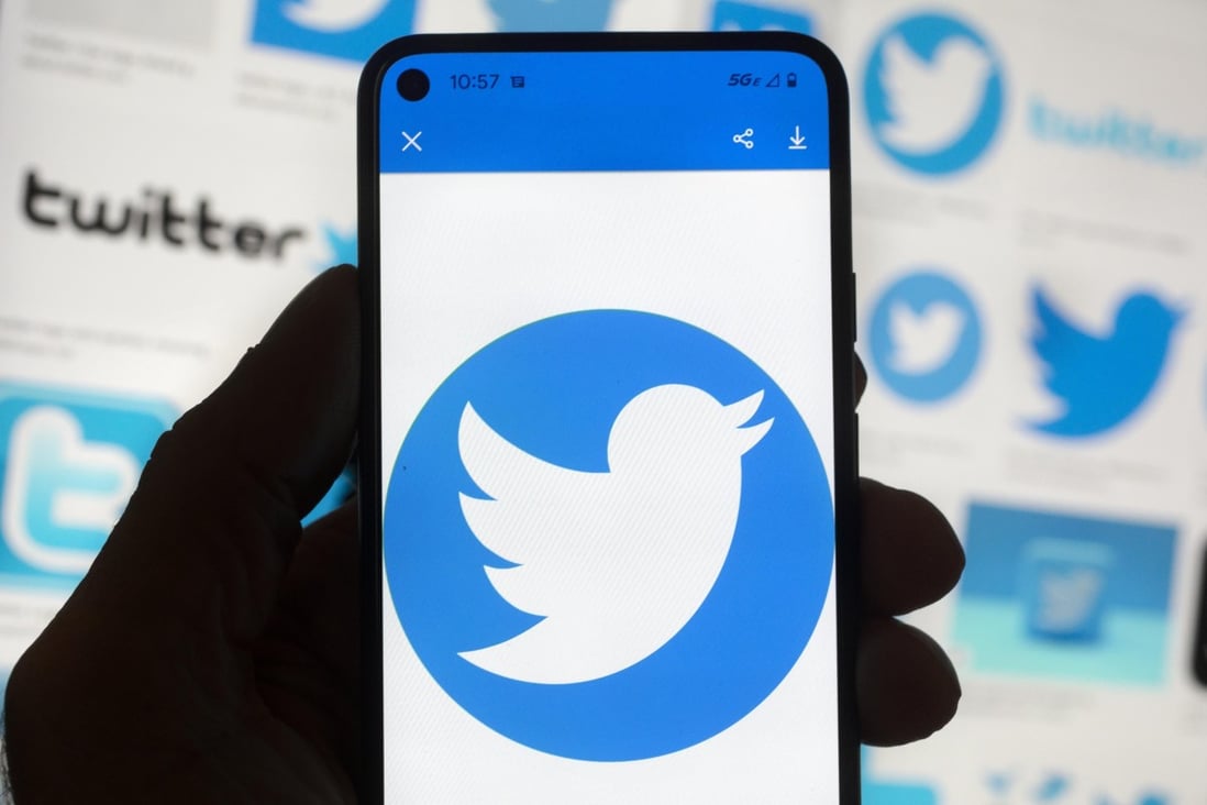 The Twitter logo is seen on a mobile phone in this arranged photo taken Oct. 14, 2022. Photo: AP