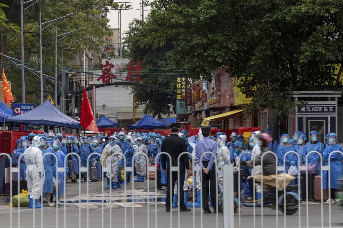 A lockdown in a Guangzhou district under China’s zero-Covid strategy has forced the shutdown of the local textile industry ahead of a busy shopping day. Photo: AP