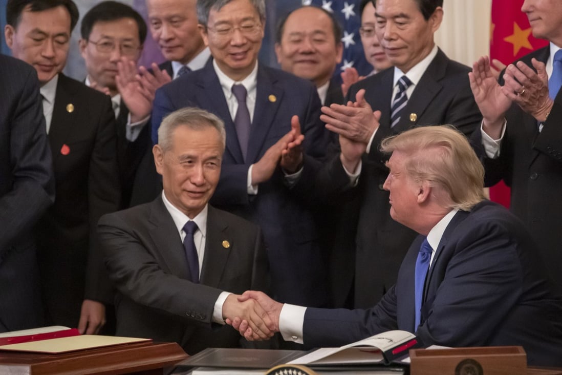 Vice-Premier Liu He shakes hands with then US president Donald Trump at the White House in January 2020, when they signed a trade agreement. Photo: EPA-EFE