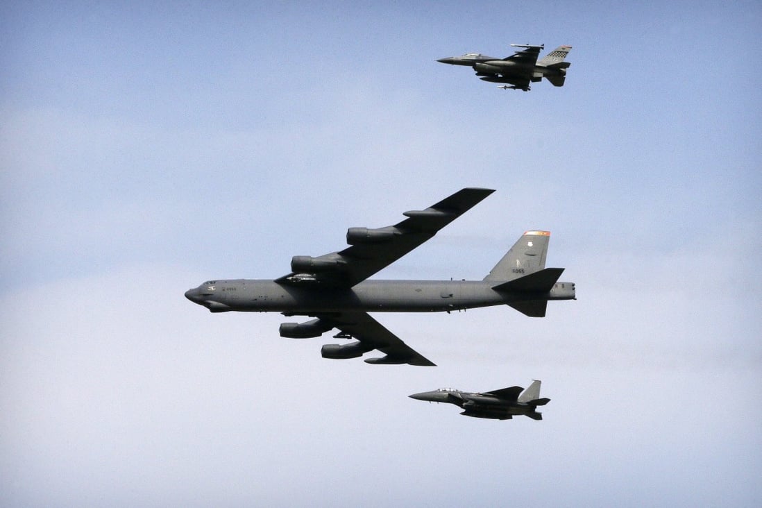 A US Air Force B-52 bomber flies over Osan Air Base in Pyeongtaek, South Korea, on January 10, 2016. The US is preparing to deploy up to six nuclear-capable B-52 bombers in northern Australia. Photo: AP