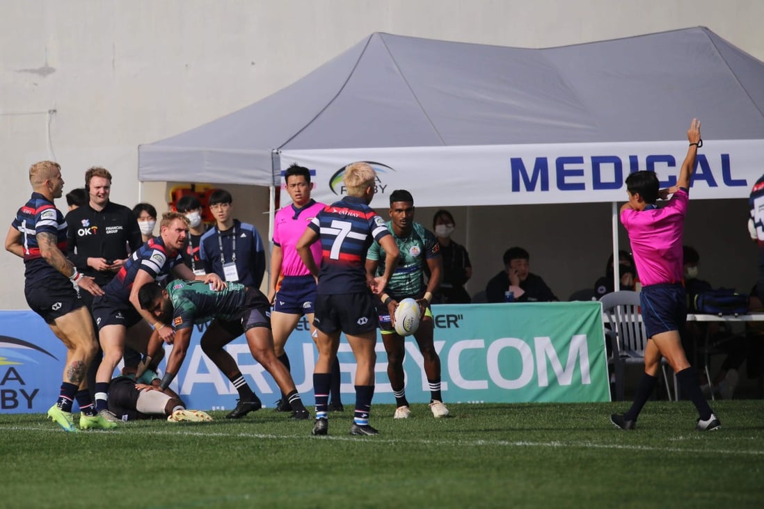 Hong Kong’s Jamie Hood over the ball against Sri Lanka at the Asia Rugby Sevens Series leg in Korea. Photo: Asia Rugby