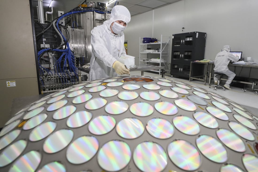 An employee works on the LED epitaxial wafer production line of a factory in Huaian, China’s Jiangsu province. Photo: VCG via Getty Images