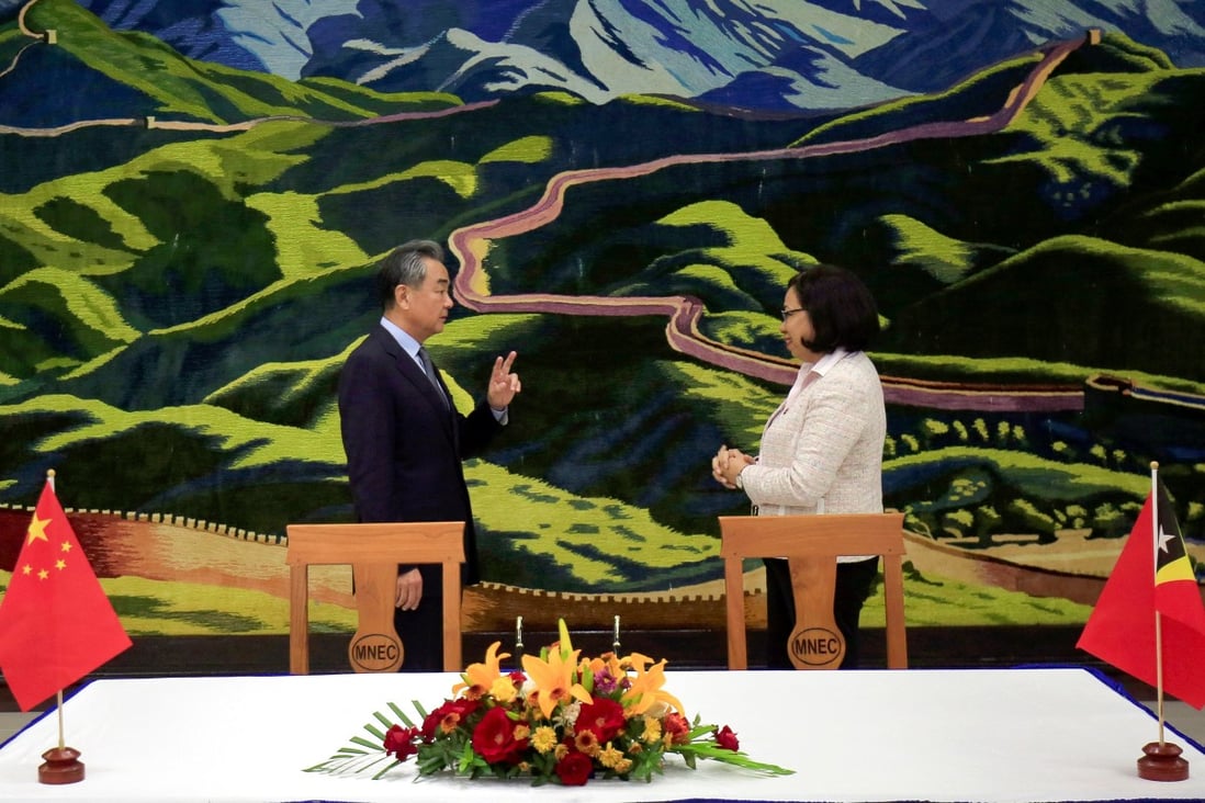 Chinese Foreign Minister Wang Yi with East Timor’s Minister of Foreign Affairs and Cooperation Adaljiza Magno during a meeting in East Timor in June. The tiny nation, which gets a lot of help from China and Australia, is set to become a member of Southeast Asia bloc Asean. Photo: Reuters