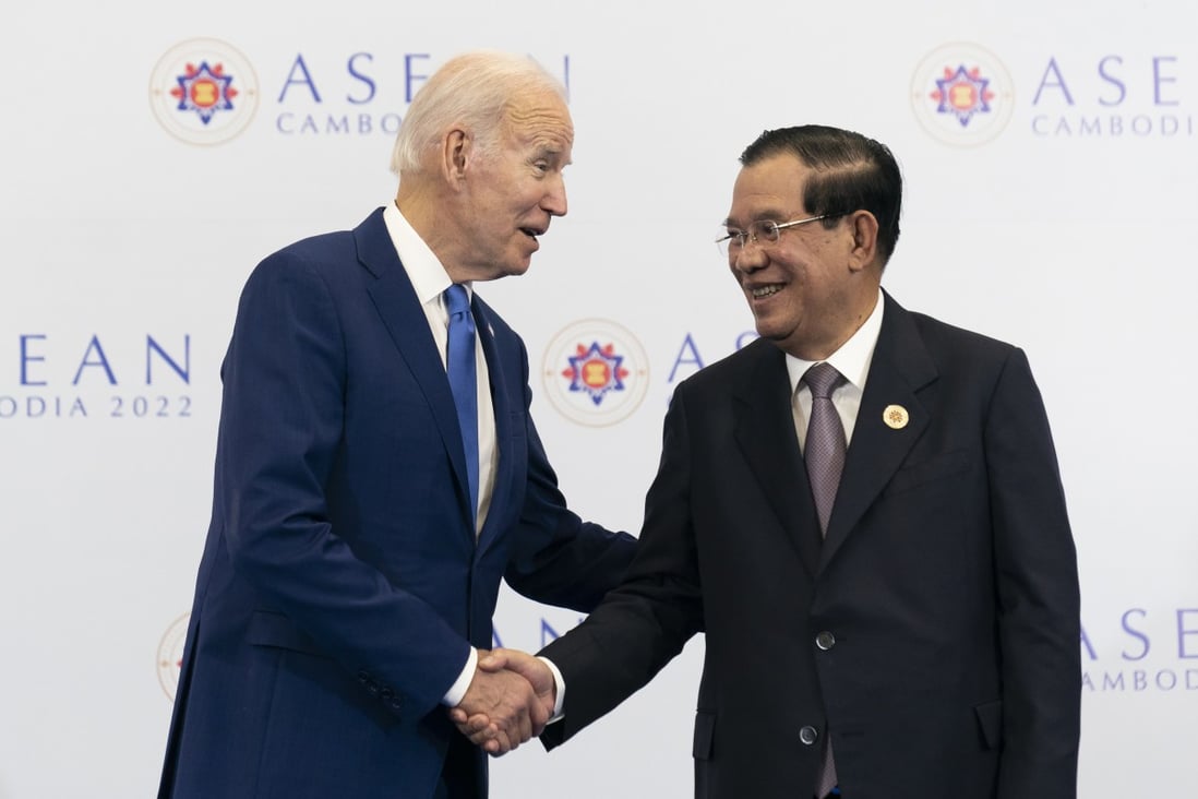 US President Joe Biden (left) shakes hands with Cambodian Prime Minister Hun Sen at the Asean summit on November 12. Photo: AP