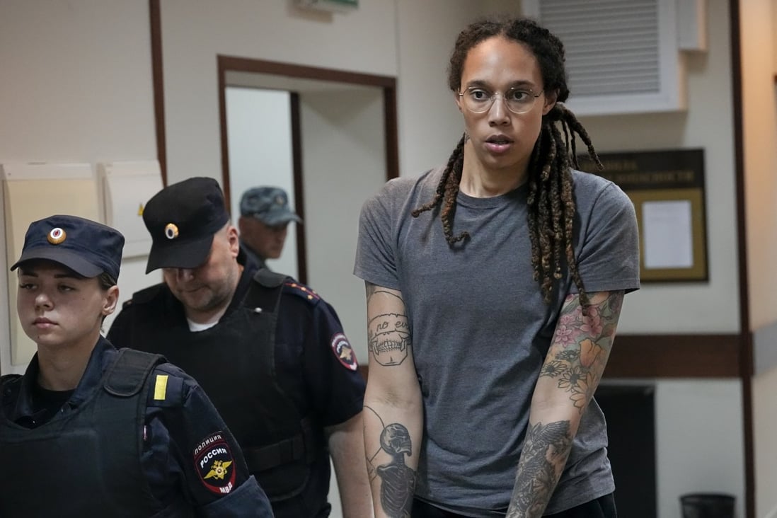 US basketball star Brittney Griner is escorted from a courtroom after a hearing in Khimki just outside Moscow, Russia in August. Photo: AP