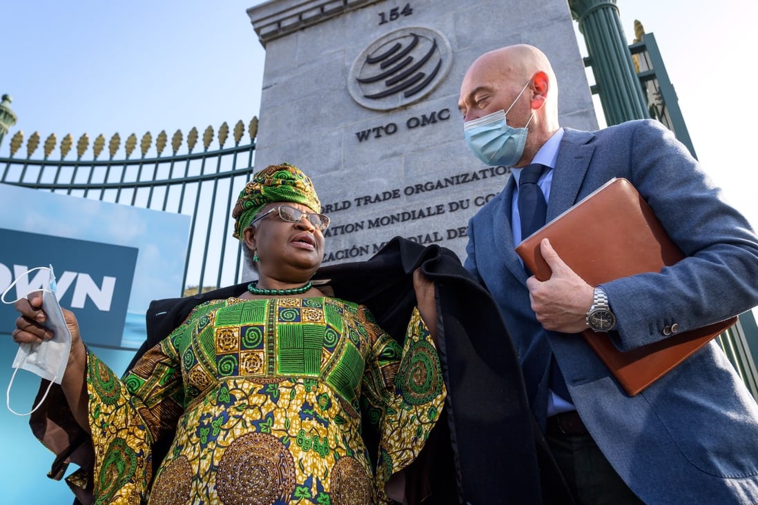 World Trade Organization director general Ngozi Okonjo-Iweala (left) of Nigeria arrives at the WTO headquarters in Geneva, Switzerland, on March 1. Okonjo-Iweala took the reins of the WTO amid hope she will infuse the beleaguered body with fresh momentum to address towering challenges, a lack of representation for the developing world and a pandemic-fuelled global economic crisis. Photo: EPA-EFE