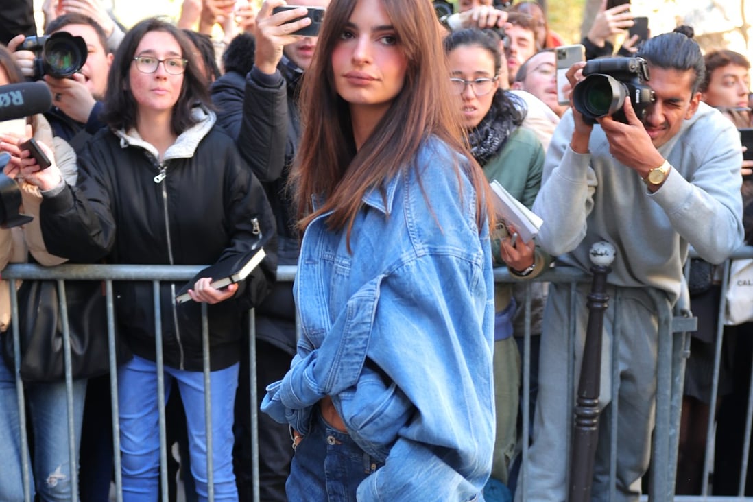 Emily Ratajkowski in double denim (a “Canadian tuxedo” at the Loewe Womenswear spring/summer 2023 show as part of Paris Fashion Week in September 2022. Denim is having another fashion moment. Photo: GC Images