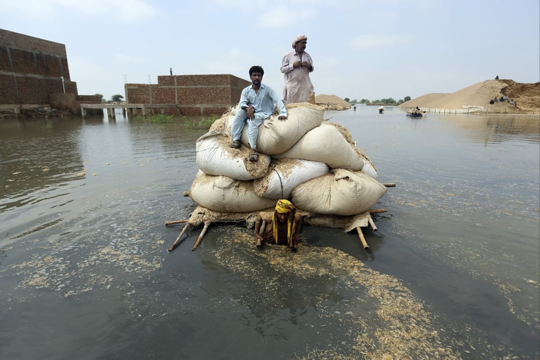 Victims of this year’s unprecedented flooding in Pakistan from monsoon rains. Tens of millions were affected. File photo: AP