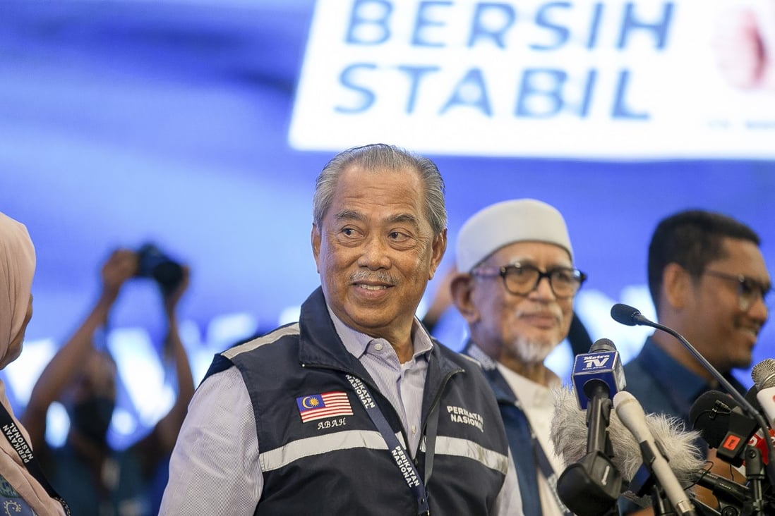 Perikatan Nasional (National Alliance ) President Muhyiddin Yassin smiles after the announcement of the results of the general election result on Sunday. Photo: AP