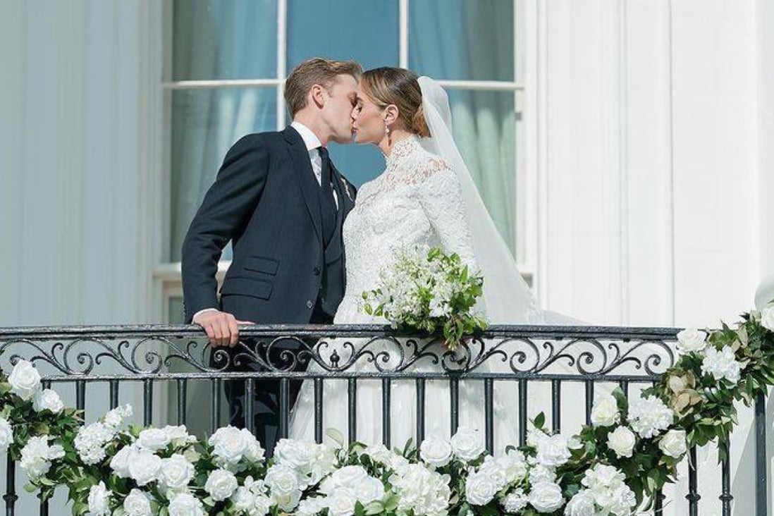 US President Joe Biden’s granddaughter Naomi Biden and Peter Neal kiss during their wedding at the White House on November 19. The bride wore a Ralph Lauren bridal gown for the ceremony, the first at the White House in nearly a decade. Photo: Instagram/@rafanellievents