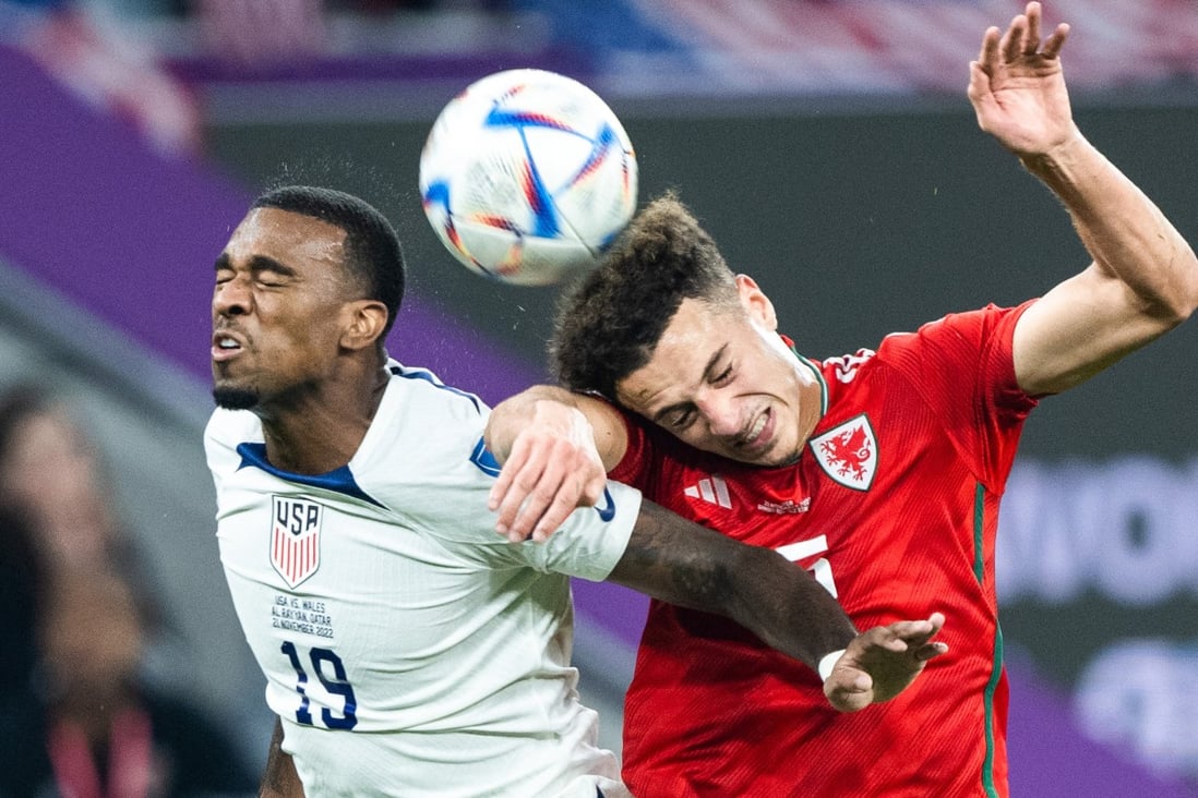 Haji Wright (left) of the US heads the ball with Ethan Ampadu of Wales during their Group B match. Photo: Xinhua