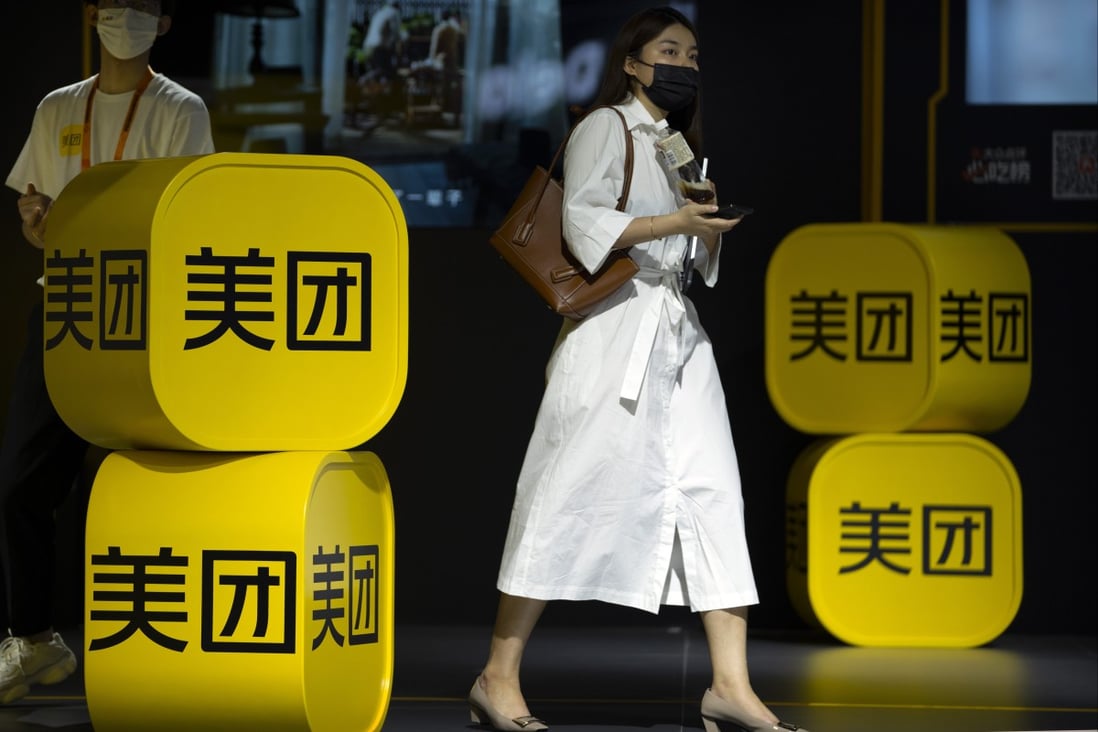A visitor walks through a booth for delivery giant Meituan at the China International Fair for Trade in Services in Beijing, Sept. 3, 2021. Photo: AP