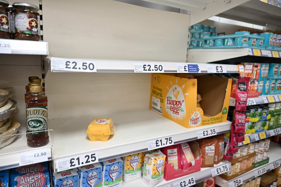 Only a handful of egg boxes remain on a supermarket shelf in London on November 17. Photo: AFP