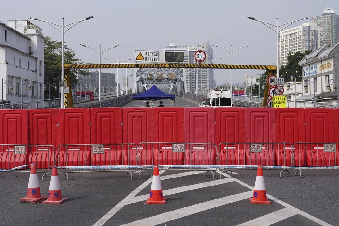 Barriers form a security checkpoint during a Covid-19 lockdown in Guangzhou’s Haizhu district on November 11. Photo: AP
