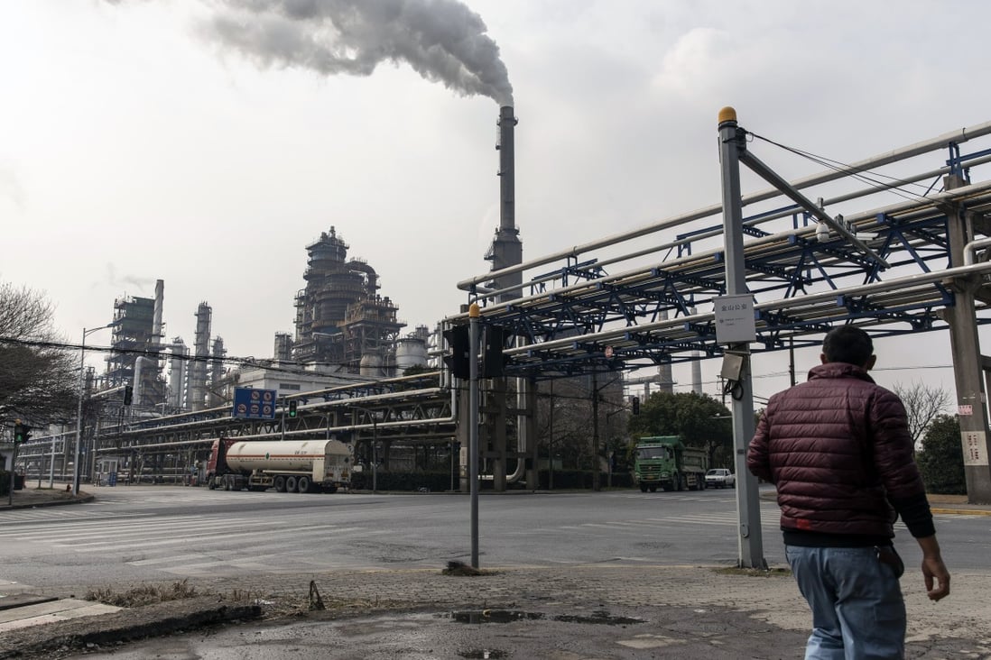 Smoke rises from a petrochemical production complex on the outskirts of Shanghai. Photo: Bloomberg