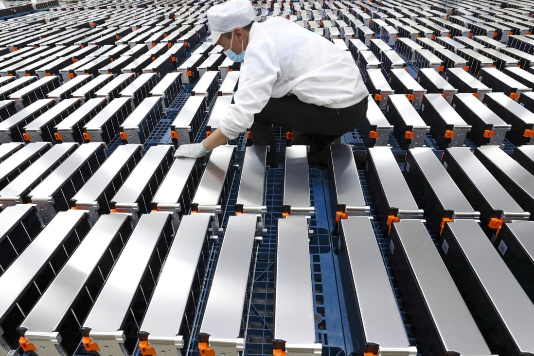 A worker checks car batteries at a factory for Xinwangda Electric Vehicle Battery in Nanjing, China, on March 12, 2021. Photo: AFP