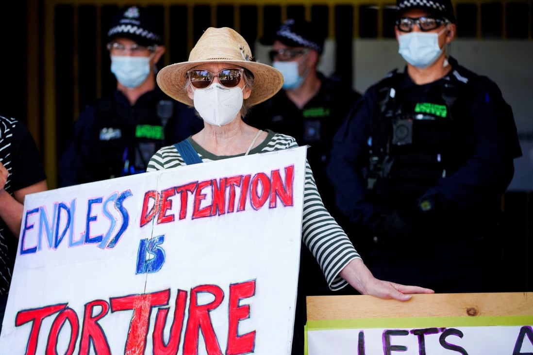A woman in Melbourne protests against Australia’s immigration detention policy earlier this year. Photo: Reuters