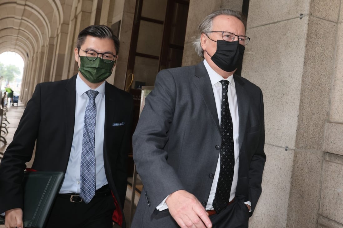 The Court of Final Appeal has dismissed the secretary for justice’s bid to overturn the permission granted to London-based Timothy Owen (seen in black mask) to join Jimmy Lai’s defence. Photo: Dickson Lee