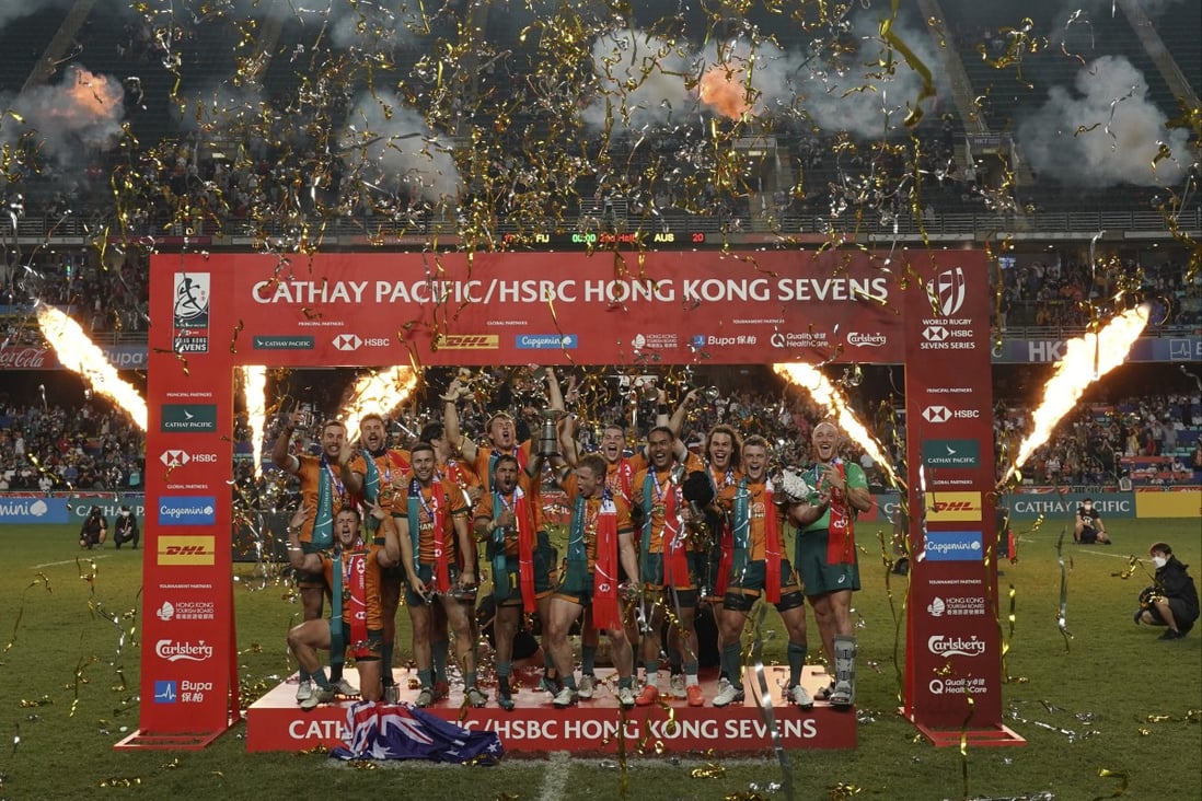 Australia players celebrate winning the Cathay Pacific/HSBC Hong Kong Sevens. Photo: AP