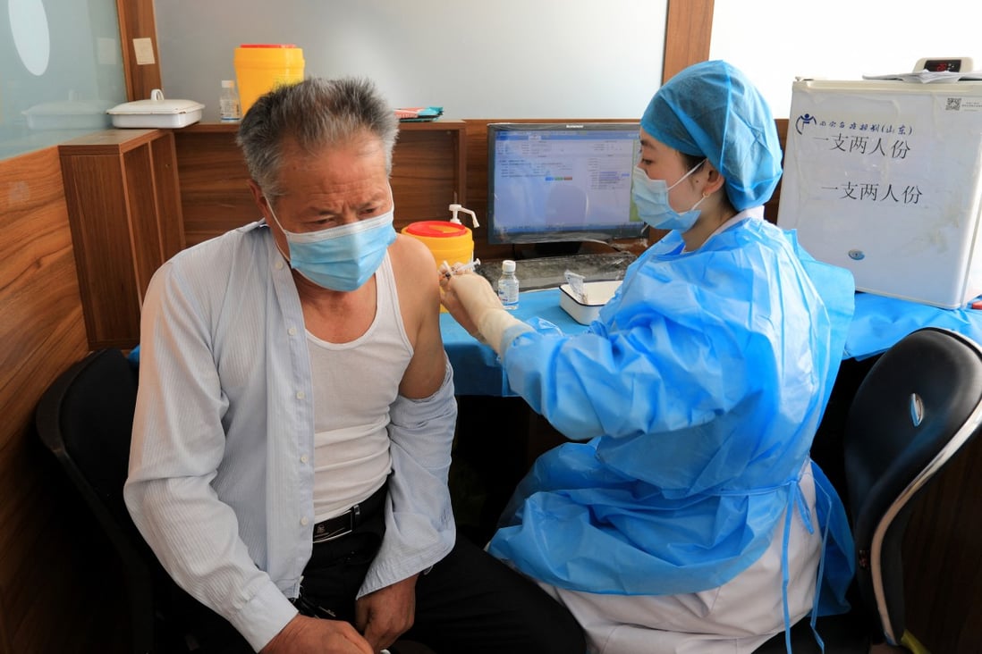 Some 68.7 per cent of people in mainland China aged over 60 have had three Covid-19 shots, and authorities want more to get vaccinated. Photo: AFP
