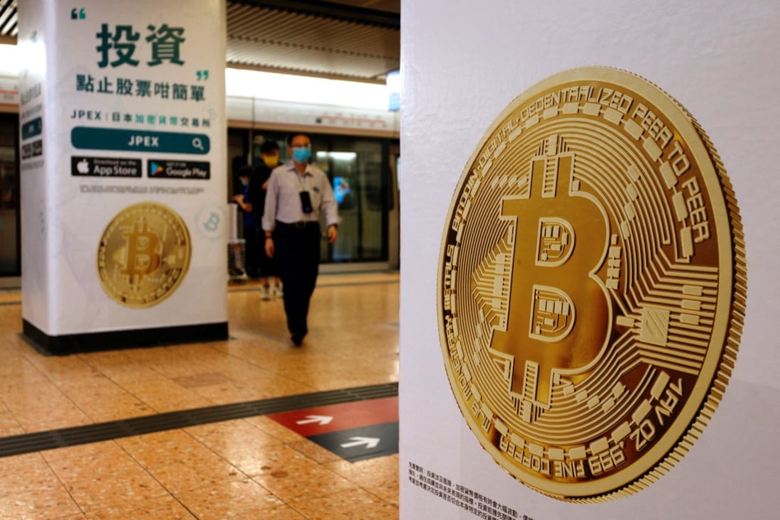 Advertisements for a crypto exchange show a Bitcoin symbol at a Mass Transit Railway station in Hong Kong in October 2021. Photo: Reuters