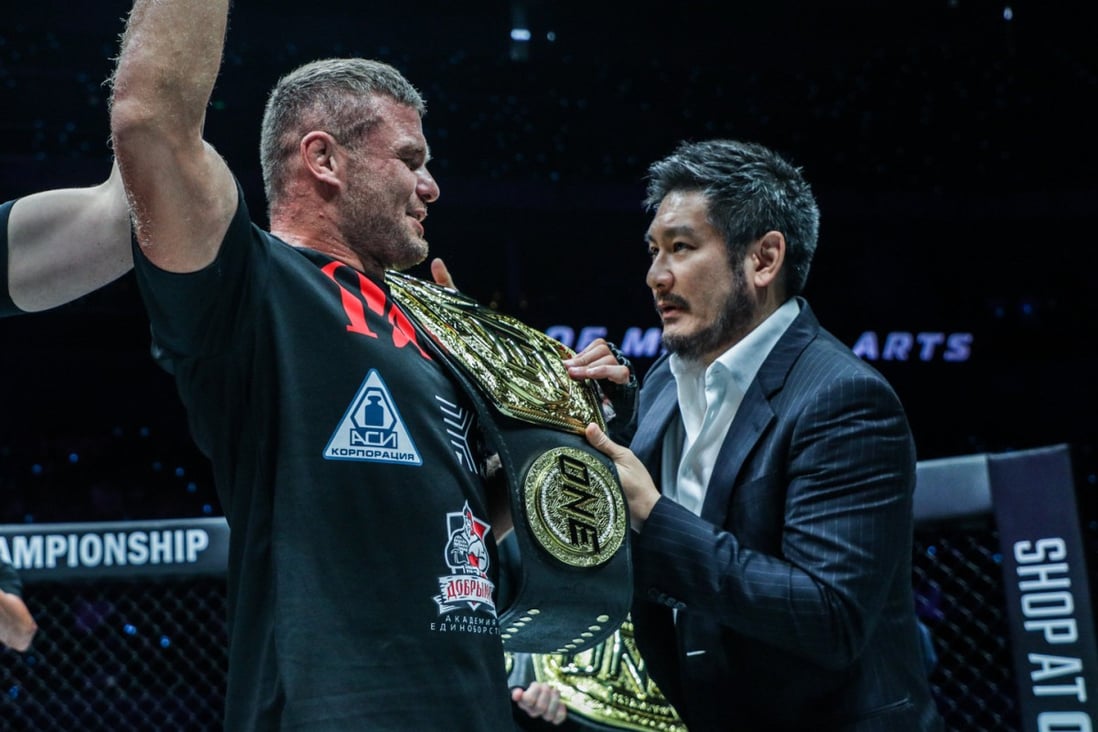ONE chairman and CEO Chatri Sityodtong places the light heavyweight title on Anatoly Malykhin’s shoulder in Manila. Photoss: ONE Championship