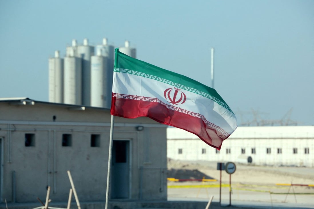 An Iranian flag in Iran’s Bushehr nuclear power plant, during an official ceremony to kick-start works on a second reactor at the facility. Photo: AFP