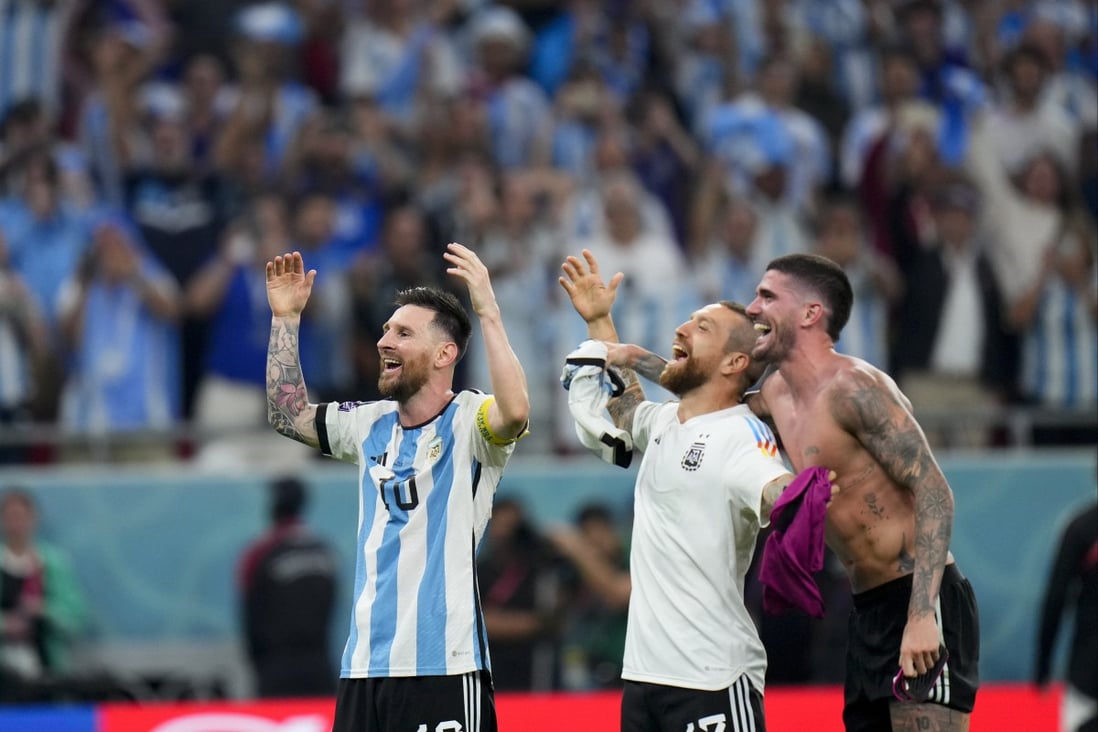 Argentina’s Lionel Messi, left, Alejandro Gomez, centre, and Rodrigo De Paul celebrate their Fifa World Cup win against Australia in Doha, Qatar on Saturday. Photo: AP