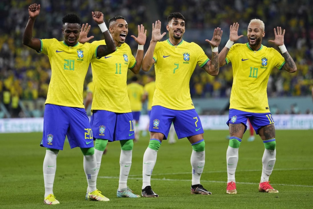 Brazil’s Neymar celebrates with teammates Lucas Paqueta, Raphinha and Vinicius Jr after scoring his side’s second goal during the World Cup round of 16 soccer match against South Korea, at the Stadium 974 in Doha on Monday. Photo: AP