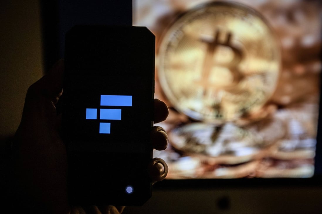 The FTX logo on a smartphone arranged in Barcelona, Spain, on November 15, 2022. Photo: Bloomberg