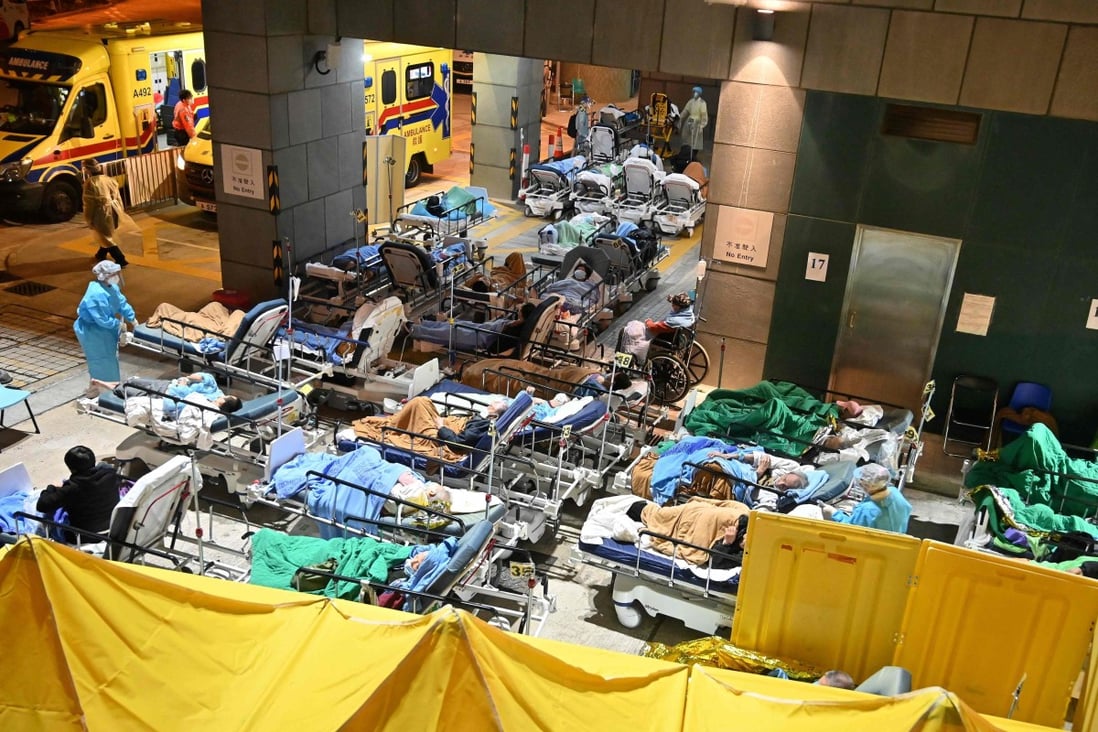 People lie in hospital beds outside the Caritas Medical Centre in Hong Kong in February 2022. Photo: AFP