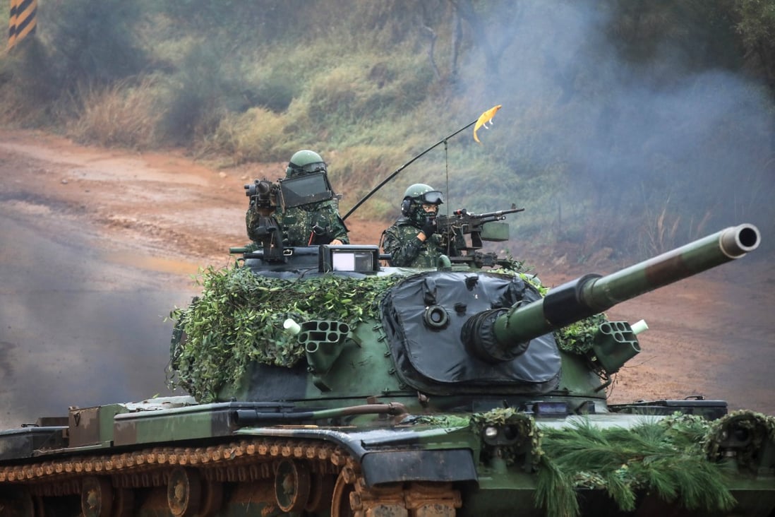Taiwan Armed Forces soldiers crew a  battle tank during a military combat live-fire exercise in Hsinchu, Taiwan. The US Congress is considering legislation that will help Taiwan pay for arms sales from US suppliers.  Photo: Bloomberg