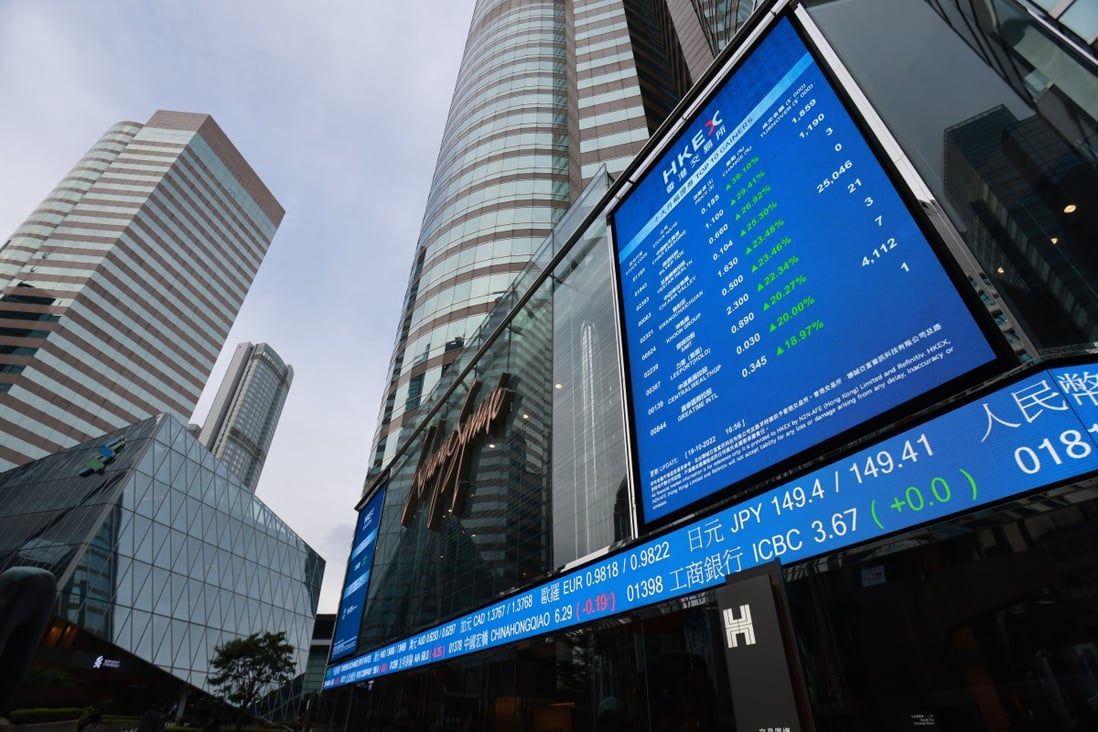 An electronic board displays stock transactions in October outside Exchange Square in Central, Hong Kong. Photo: May Tse