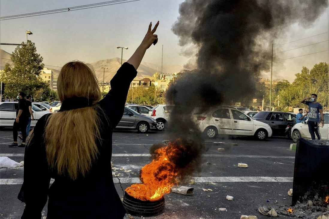 Iranians protest against the death of Mahsa Amini in Tehran. File photo: AP/Middle East Images