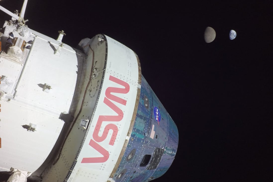 In this photo provided by Nasa, Earth and its moon are seen from the Orion spacecraft on November 28, when it reaches its maximum distance, some 432,000km away, from Earth, during the Artemis I moon mission. Orion has travelled farther than any other spacecraft built for humans. Photo: Handout via AFP