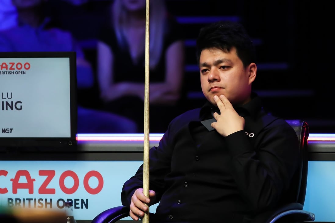 Lu Ning of China reacts in a first-round match against Jack Lisowski of England on day three of the 2022 Cazoo British Open at Marshall Arena on September 28, 2022 in Milton Keynes, England. Photo: Getty Images