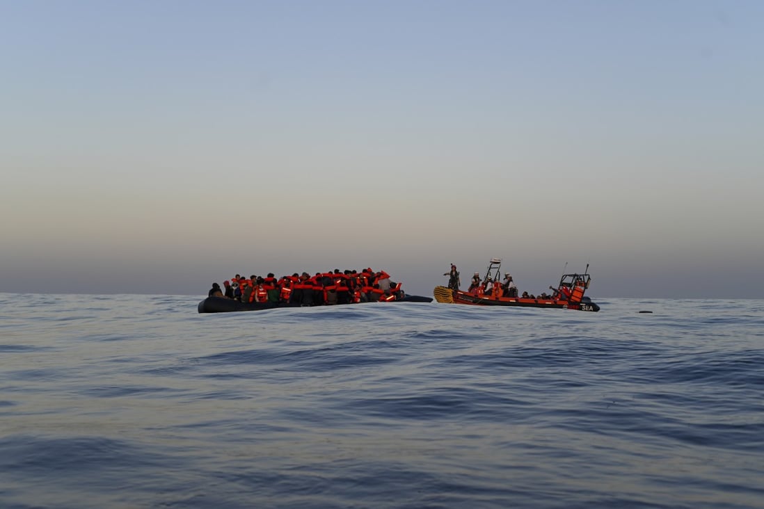 Doctors Without Borders, humanitarian organisation rescue team approaches a rubber boat with 74 migrants on board to transfer them to their rescue ship in Italy Photo: AP