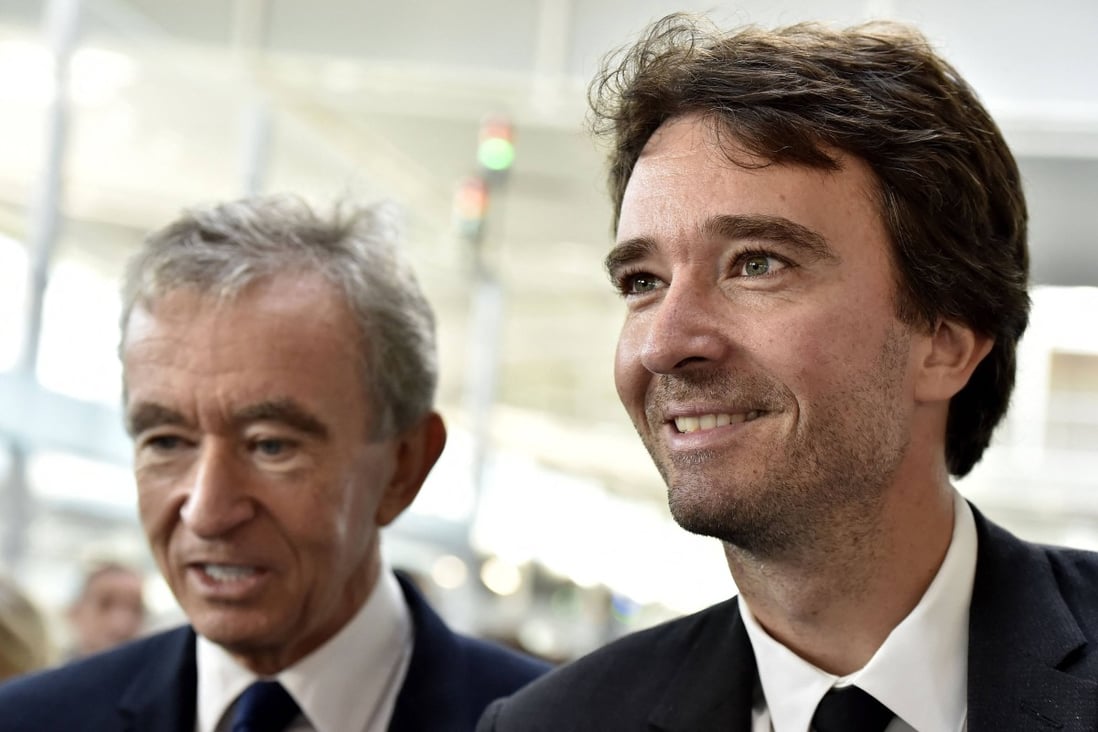 LVMH’s CEO Bernard Arnault (left) just elevated his son Antoine to a bigger role, prompting discussion about succession plans. Photo: AFP 