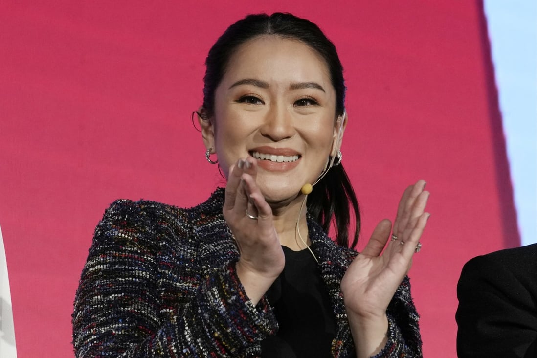 Paetongtarn Shinawatra, the daughter of former Thai Prime Minister Thaksin Shinawatra, applauds after a Pheu Thai Party general assembly meeting in Bangkok earlier this month. Photo: AP