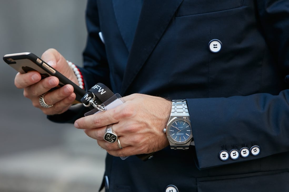 A man wears an Audemars Piguet Royal Oak watch at Milan fashion week. Big cities in Europe have seen a spike in luxury watch robberies. Photo: Shutterstock