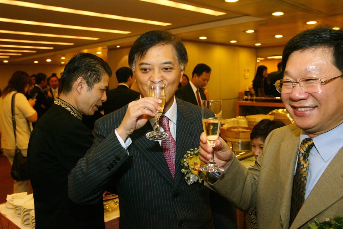 Guangzhou R&F Properties’ Vice-Chairman and President Zhang Li (right) and Chairman Li Sze-Lim (left) during the real estate developer’s listing ceremony on the Hong Kong Stock Exchange on 14 July 2005. Photo: SCMP