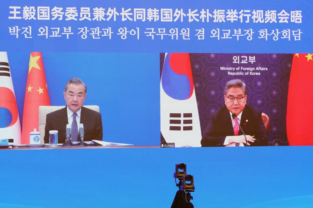 Chinese Foreign Minister Wang Yi (left) holds a video conference with his South Korean counterpart Park Jin on Monday. Photo: Weibo