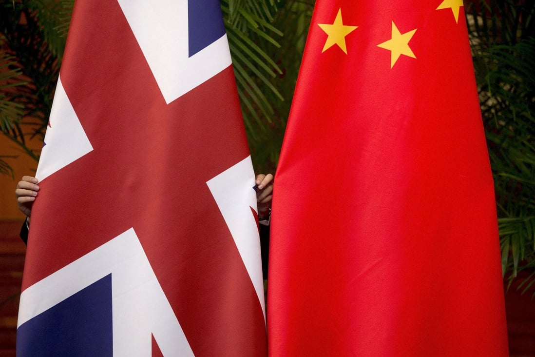 The British Chamber of Commerce in China says multinational firms in the country are taking a wait-and-see approach amid speculation over a further easing of coronavirus controls. Photo: Reuters