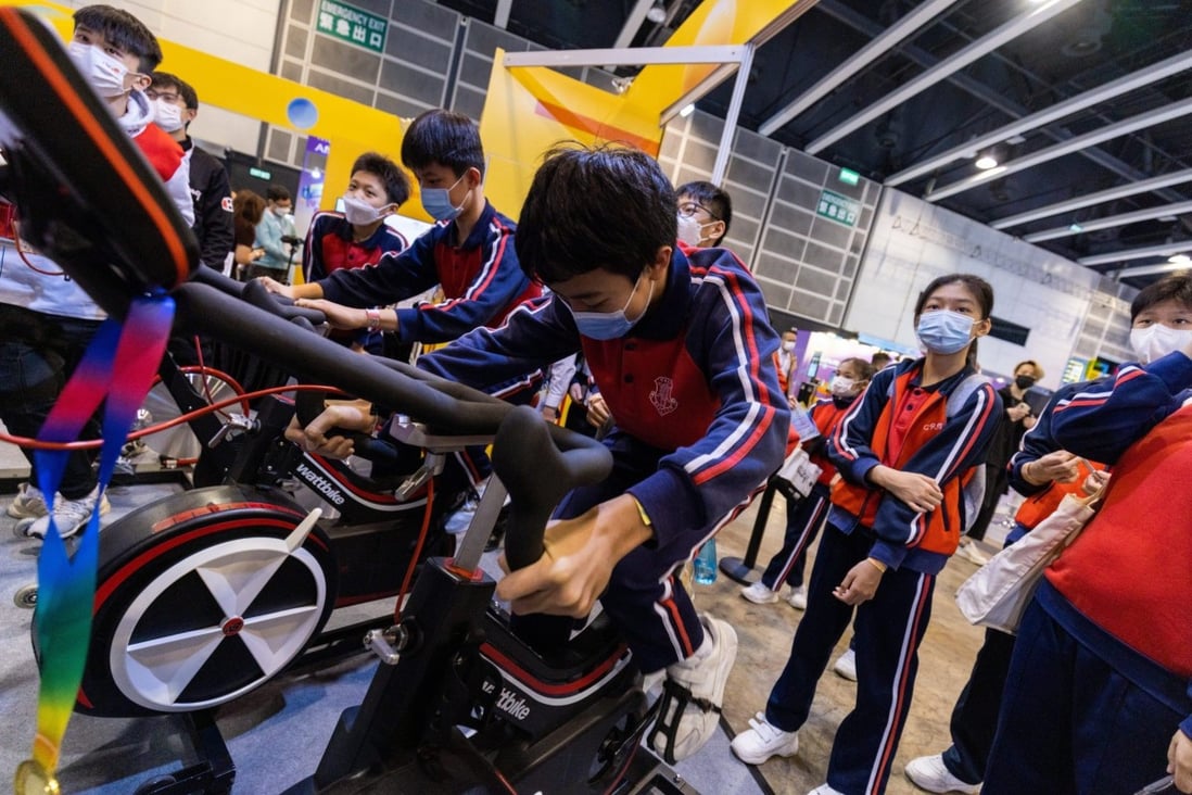 Schoolchildren at the Future Skills event enjoy the creations of VTC students. Photo: Ping On / SCMP