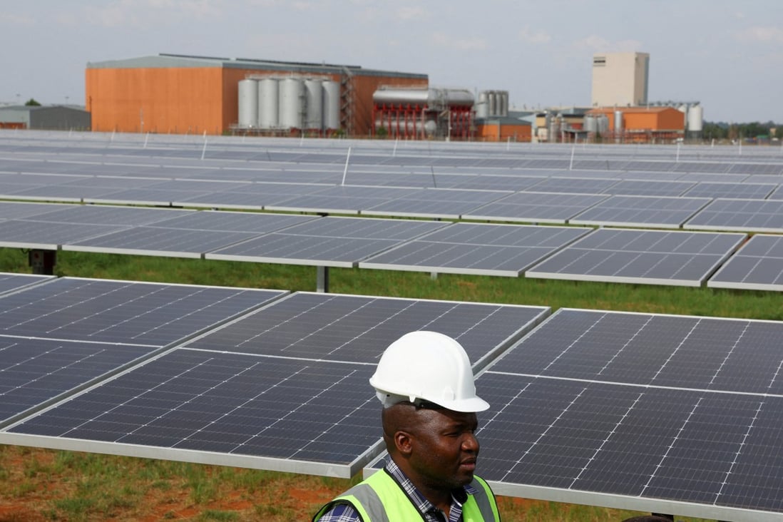 A visitor is seen at the new solar power plant of the South African arm of Heineken, at the company’s Sedibeng, Midvaal brewery in Johannesburg, South Africa, on October 26. Governments, businesses and international bodies need to come together to build resilience, but what’s stopping them? Photo: Reuters