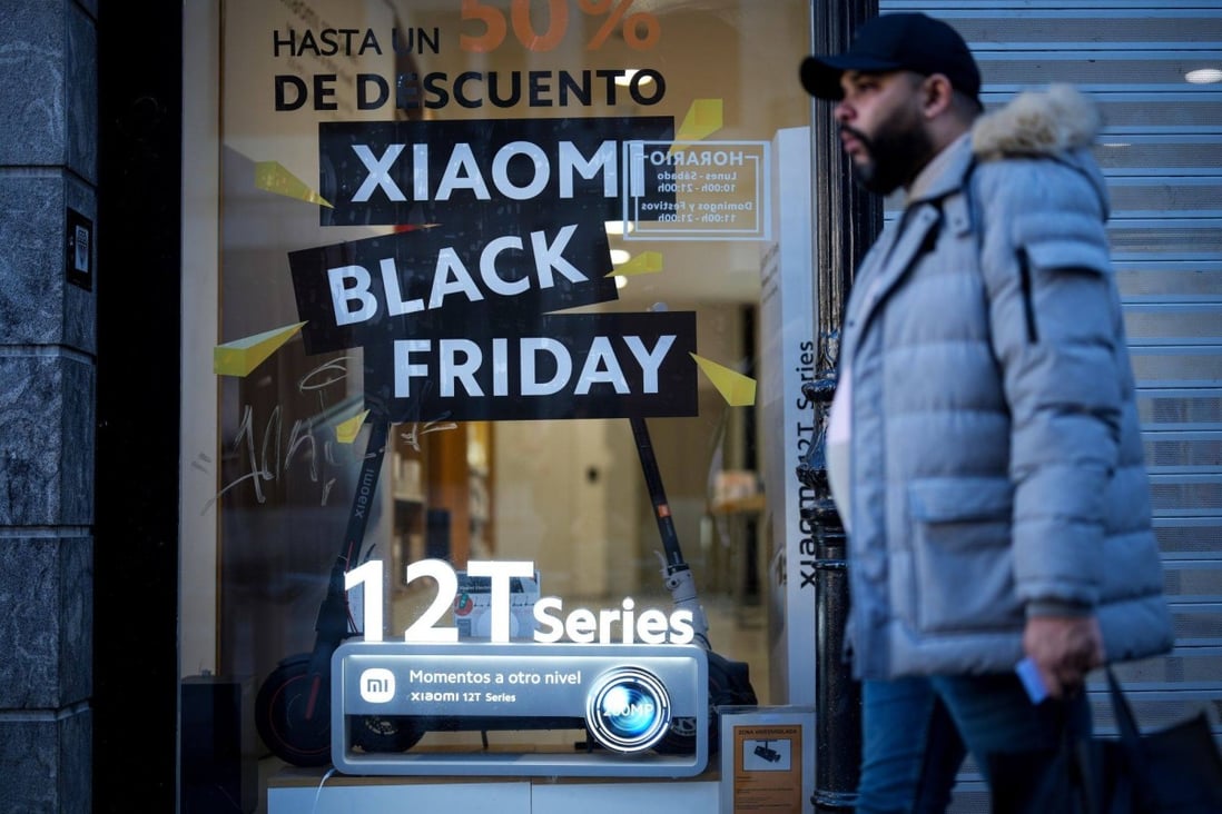Promotional signage for Black Friday in the window of a Xiaomi store in Madrid, Spain, Nov. 25, 2022. Photo: Bloomberg