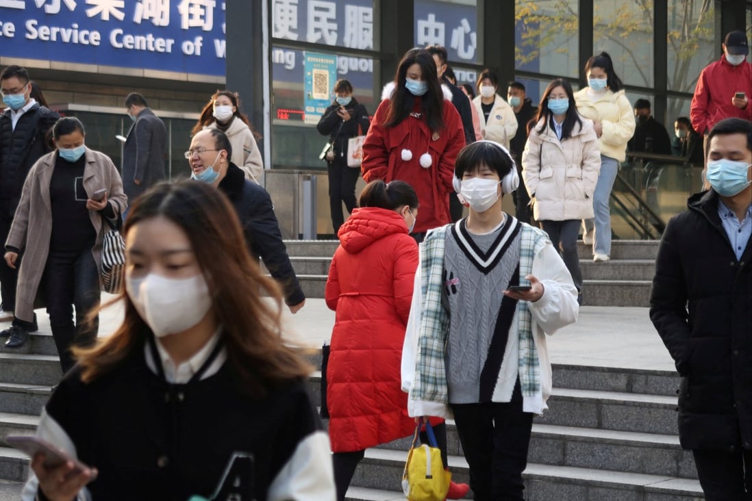 Morning rush hour outside an underground station in Wuhan, in 
China’s central Hubei province, following the easing of Covid-19 restrictions nationwide. Photo: Reuters